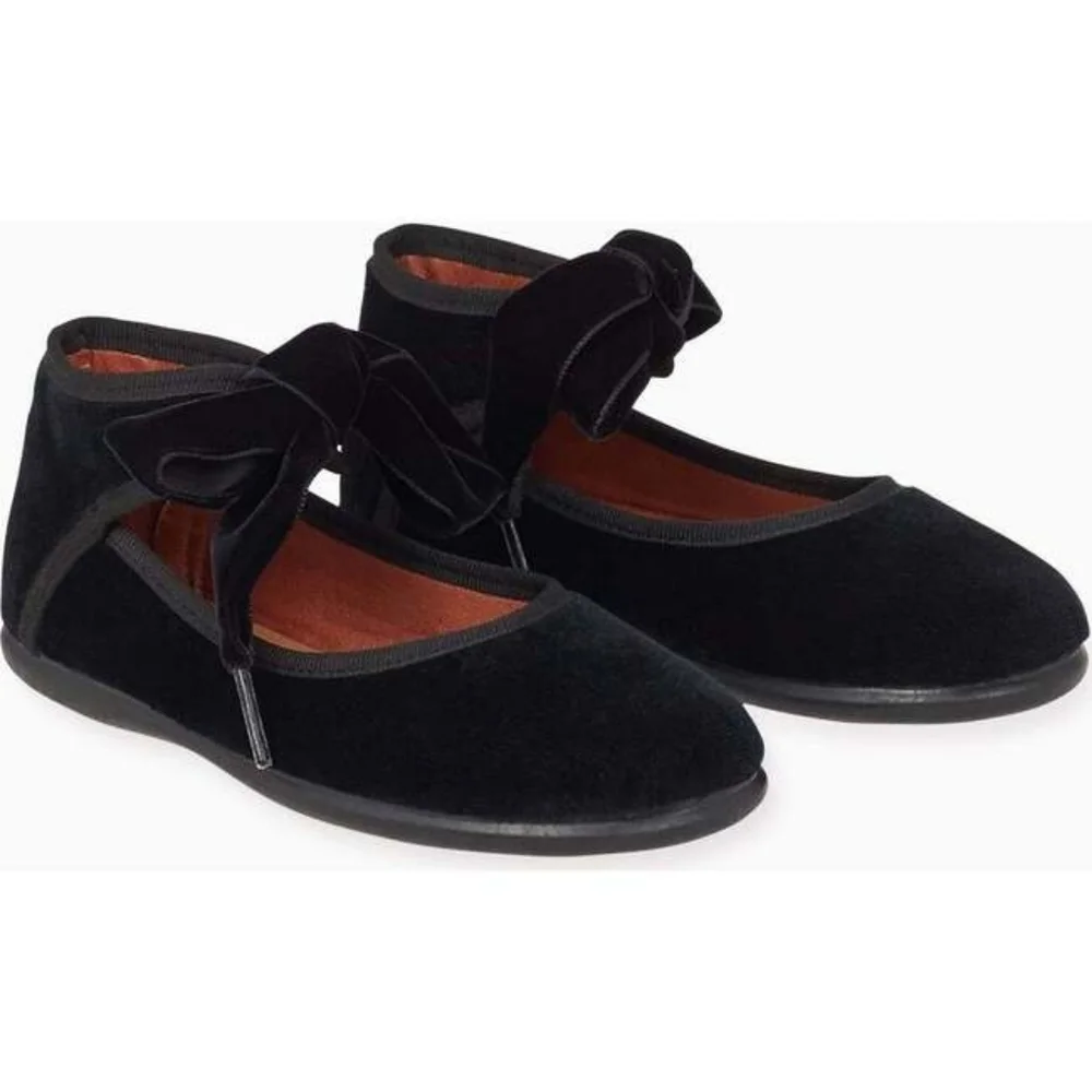 La Coqueta's stunning Black Bow Ballerina shoes.